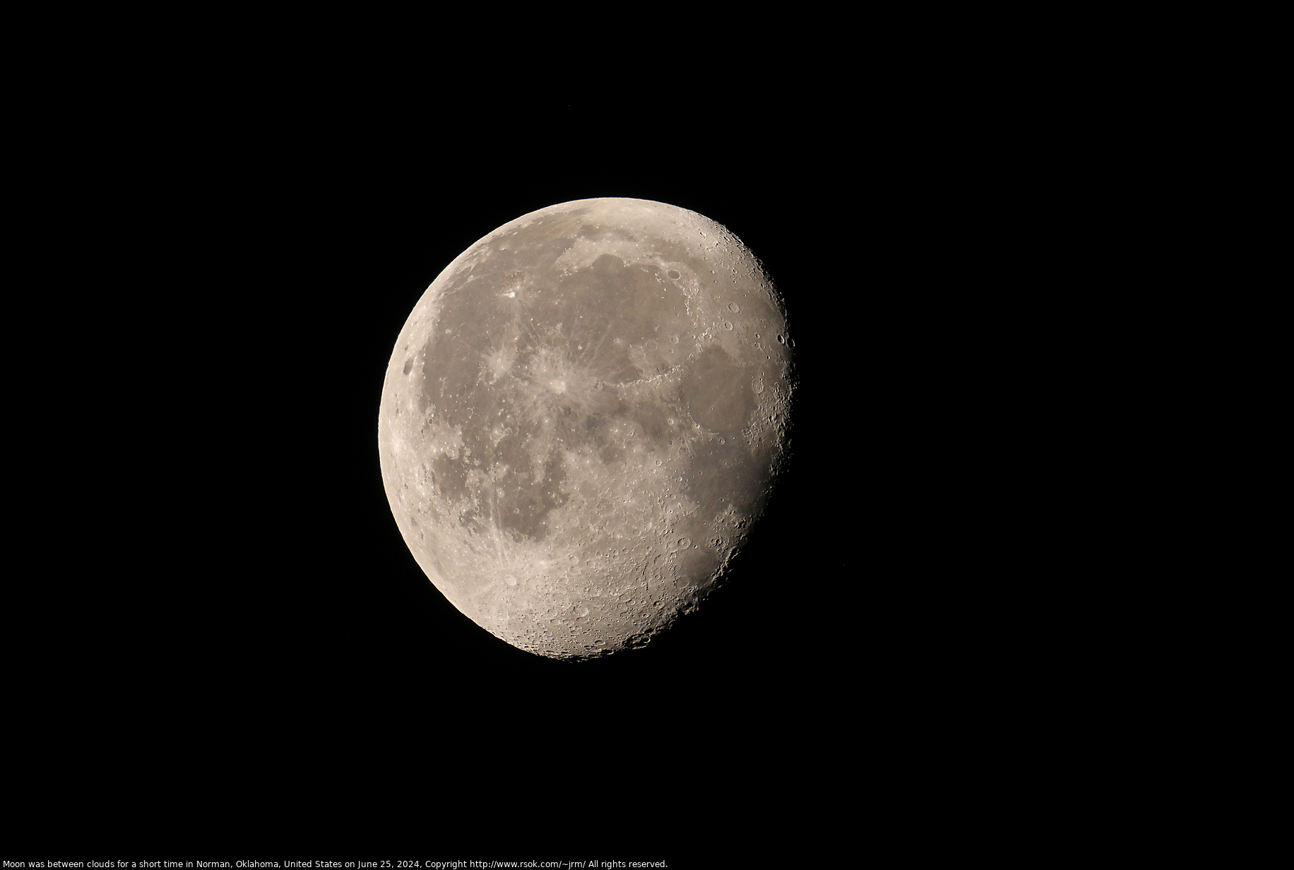 Moon was between clouds for a short time in Norman, Oklahoma, United States on June 25, 2024